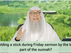Is holding a stick during friday khutbah (sermon) by the imam, part of the sunnah?